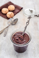 homemade vegan chocolate cream with almond butter, cocoa, sugar, rum, amaretti biscuit (italian almond biscuit)