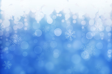 Christmas abstract winter shiny snow bokeh background with unique snowflakes