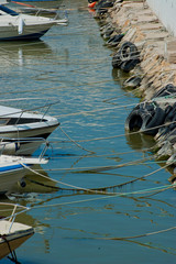 Bow of boats tied to the shore