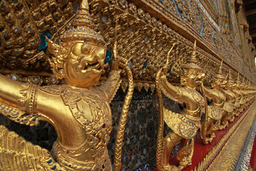 Fototapeta premium Statue and external decoration in Wat Phra Kaew temple complex, Royal Palace, Bangkok, Thailand