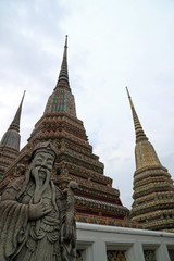 Fototapeta premium Statue and external decoration in Wat Phra Kaew temple complex, Royal Palace, Bangkok, Thailand