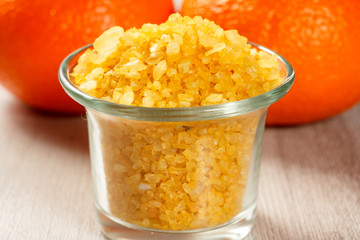 Spa nature products. Glass bowl with yellow sea salt for bathroom