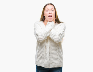 Young beautiful caucasian woman wearing winter sweater over isolated background shouting and suffocate because painful strangle. Health problem. Asphyxiate and suicide concept.