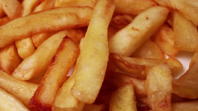 French fries rotating texture pattern closeup footage