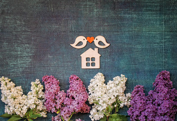figures of wooden birds,wooden house and a lilac branches   / love,valentines,anniversary,housewarming card
