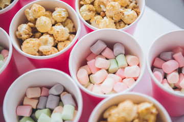Marshmallow, popcorn. Candy Bar. Delicious sweet buffet.