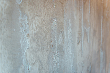 texture of the wall with gray handmade plaster