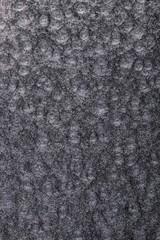 black hammered metal background,abstract metalic texture, sheet of metal surface painted with hammer paint