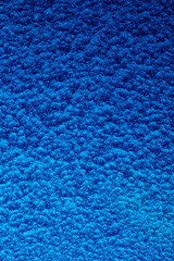 blue hammered metal background,abstract metalic texture, sheet of metal surface painted with hammer paint.