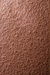 bronze or copper hammered metal background,abstract metalic texture, sheet of metal surface painted with hammer paint