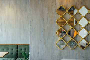 modern pizzeria interior with gray plaster on the walls