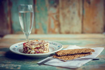 plate with salat, glass and cookies