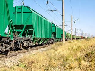 Rail cars for the transportation of grain in transit