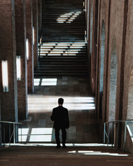 man coming down the stairs