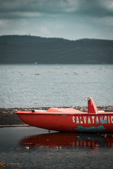 Emergency rowing boat with white Italian lettering 