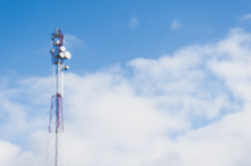 Mobile communication tower blurred background copy space