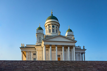 Fototapeta na wymiar Helsinki cathedral and steps on blue sky background , finland