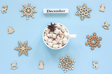 calendar December Mug cocoa marshmallows and large wooden snowflakes