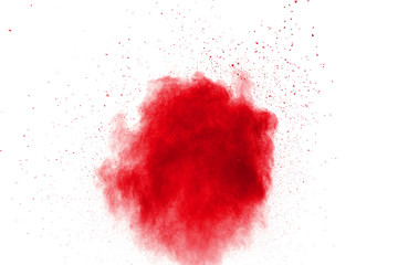 abstract red dust splattered on white background. Red powder explosion.Freeze motion of red particles splashing.