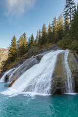 Waterfall in Tracy Arm fjord near Juneau Alaska