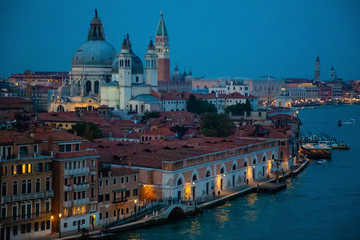 Fototapeta premium Night view of Grand Canal and basilica di santa maria della salute in Venice in Italy