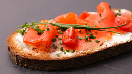 bread slice with cheese and salmon
