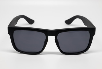 Fashion sunglasses isolated on white background, black plastic.