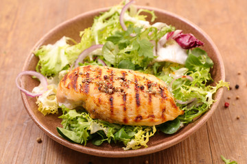 fried chicken breast with salad
