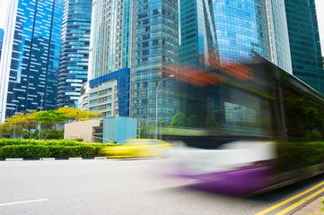 Naklejka premium Bus motion blur Singapore Downtown