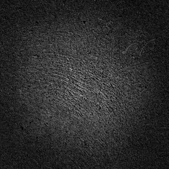 black rugged background with vignette