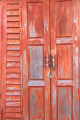 Fototapeta na wymiar Old wooden house door red Antique wooden house