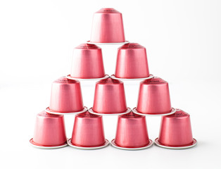 Coffee capsules on white background.