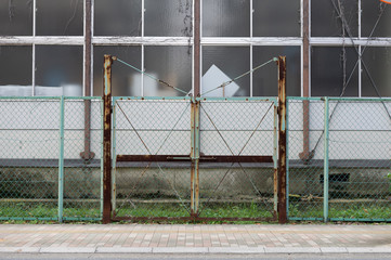 sidewalk by street wall & door