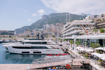 Yachts and ships in the port of Monaco in summer solar Europe