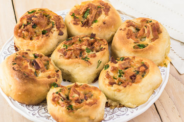 Homemade cheesy bacon holiday rolls.