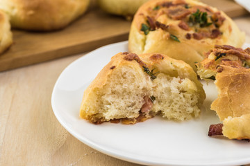 Homemade cheesy bacon holiday rolls.