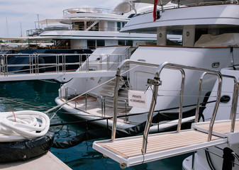 Privat entrance Yachts and ships in the port of Monaco in summer solar Europe