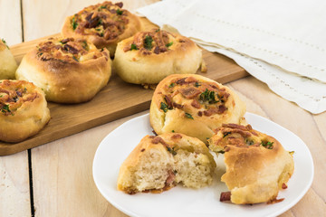 Homemade cheesy bacon holiday rolls.