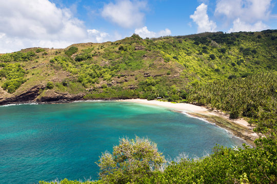 White sand beach in Hanatekua Bay, Hiva Oa, Marquesas Islands, French Polynesia