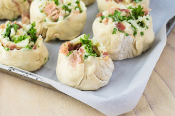 Homemade cheesy bacon holiday rolls.