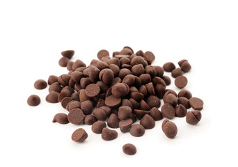 Pile of delicious dark chocolate chips on white background