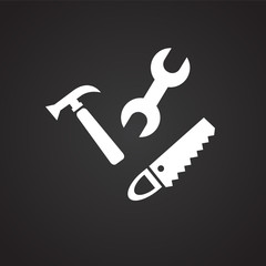 Construction tools on black background icon