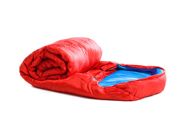 Rolled sleeping bag on white background. Camping equipment