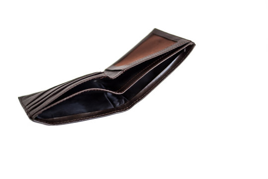 open empty brown wallet on white background. isolate