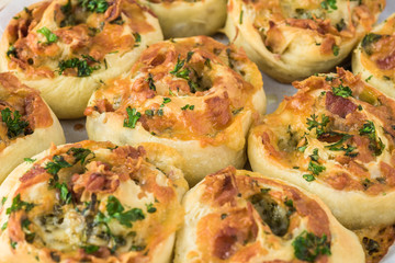 Homemade cheesy bacon holiday rolls.