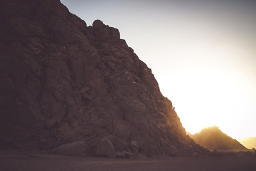 Desert in Egypt. Sharm el Sheikh. Sand and Sand Borkhan. Rock and sunset.
