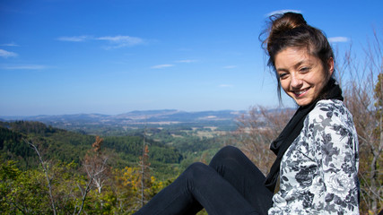 Naklejka premium beautiful arabic girl smile to camera in Germany with landscape background