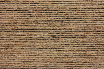 Rough textured background natural fiber in brown