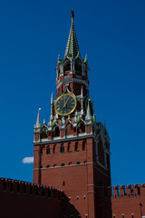 Fototapeta na wymiar Spasskaya Tower (Saviour Tower) is the main tower on the eastern wall of the Moscow Kremlin which overlooks the Red Square. Moscow, Russia.