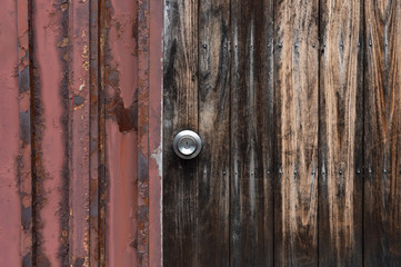 metal handle on a old wooden door